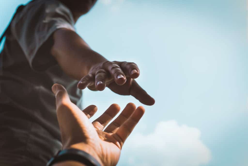 Help Concept hands reaching out